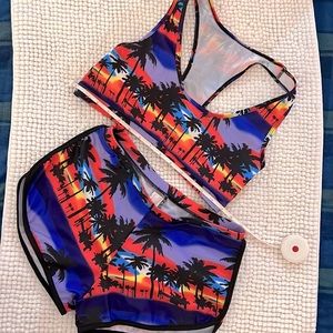 Palm tree swimsuit, size women’s Large. Never worn. New without tags.